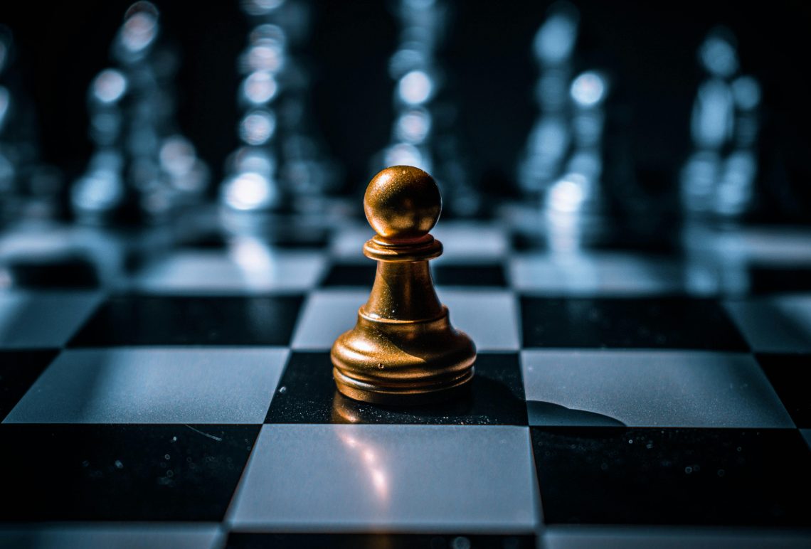 Gold Chess Piece On Board